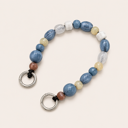 Mixed bead phone chain with blue, cream, and clear beads and silver spring-ring clasps — Folie à Trois Rosalind wholesale phone chain
