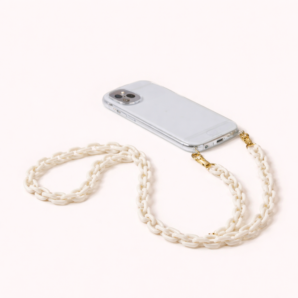 Route Long Phone Chain in a cream acrylic chunky chain, clipped to a clear phone case with gold hardware.