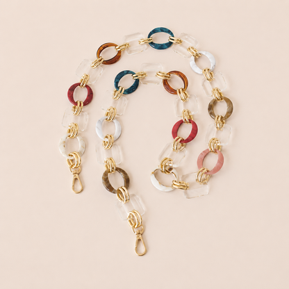 Multicolor acrylic ring-link phone chain in navy, rust, pink, and clear with gold connectors — Folie à Trois Rowan wholesale phone chain