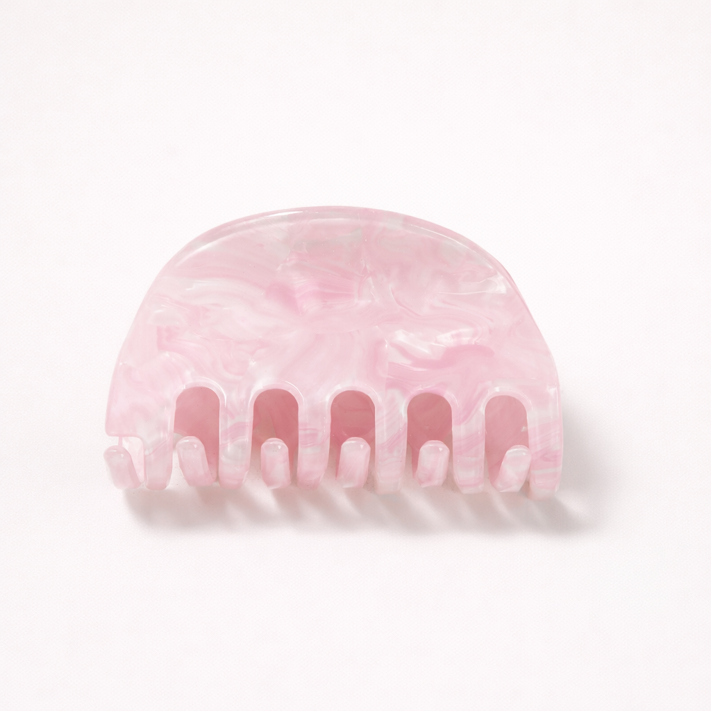 Ruth HAIR CLIP half-moon acetate claw clip in a solid pink pearl shade, studio shot.