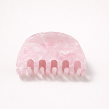 Ruth HAIR CLIP half-moon acetate claw clip in a solid pink pearl shade, studio shot.