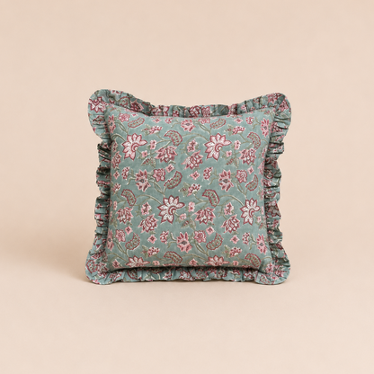 Sage green square cushion with a pink and burgundy floral vine print and ruffled trim, the Sehra Green Square Cushion on a neutral backdrop.