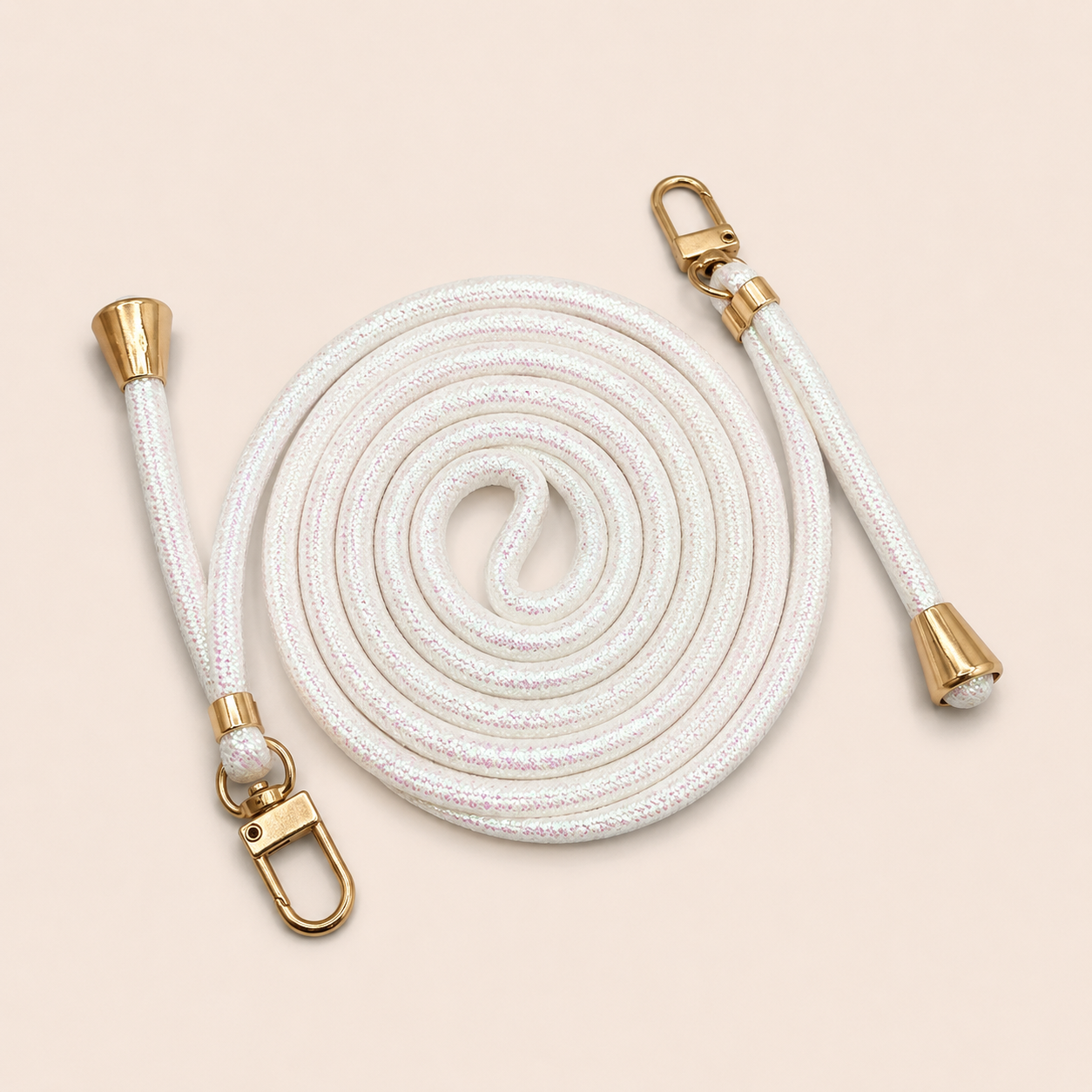 White Shimmery PHONE CORD with a metallic sheen, coiled with gold hardware, shown as a flat lay.