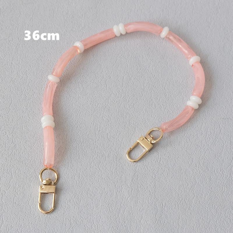 Pink Smooth Moves PHONE CHAIN, 36cm bracelet length, with gold clasps and white spacer beads.