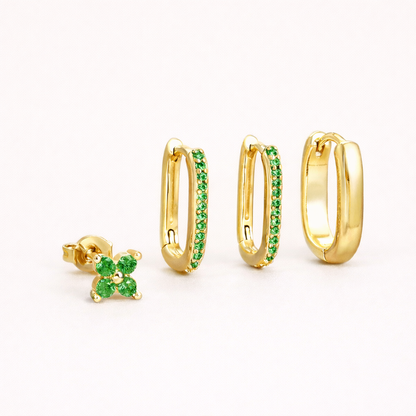 Sophia Set in gold with green crystal accents, showing the clover stud and crystal-lined rectangular hoop trio.
