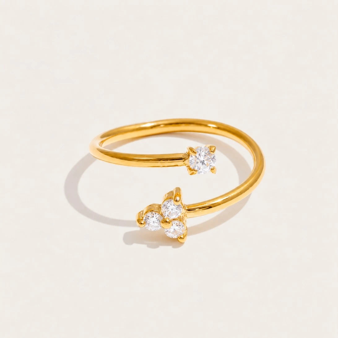 Gold Stella RING: a fine open band finished with a small sparkling white zirconia stone — Folie à Trois