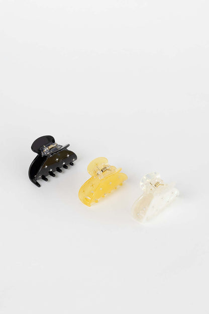 Summer Bliss HAIR CLIP three claw clips shown together in black, yellow and white colorways with crystal accents, studio shot.