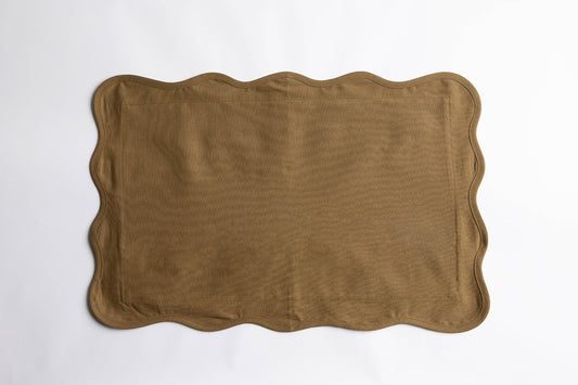 Flat lay of the Terry Rectangle Linen cushion in khaki-olive linen with a wavy scalloped edge on a plain white background.