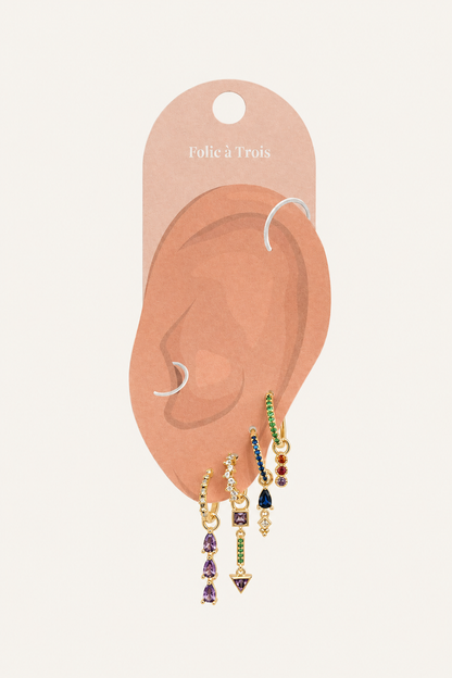 Illustrated Folie a Trois earring card showing the Tessa Set huggie hoops with colorful gemstone drop charms.