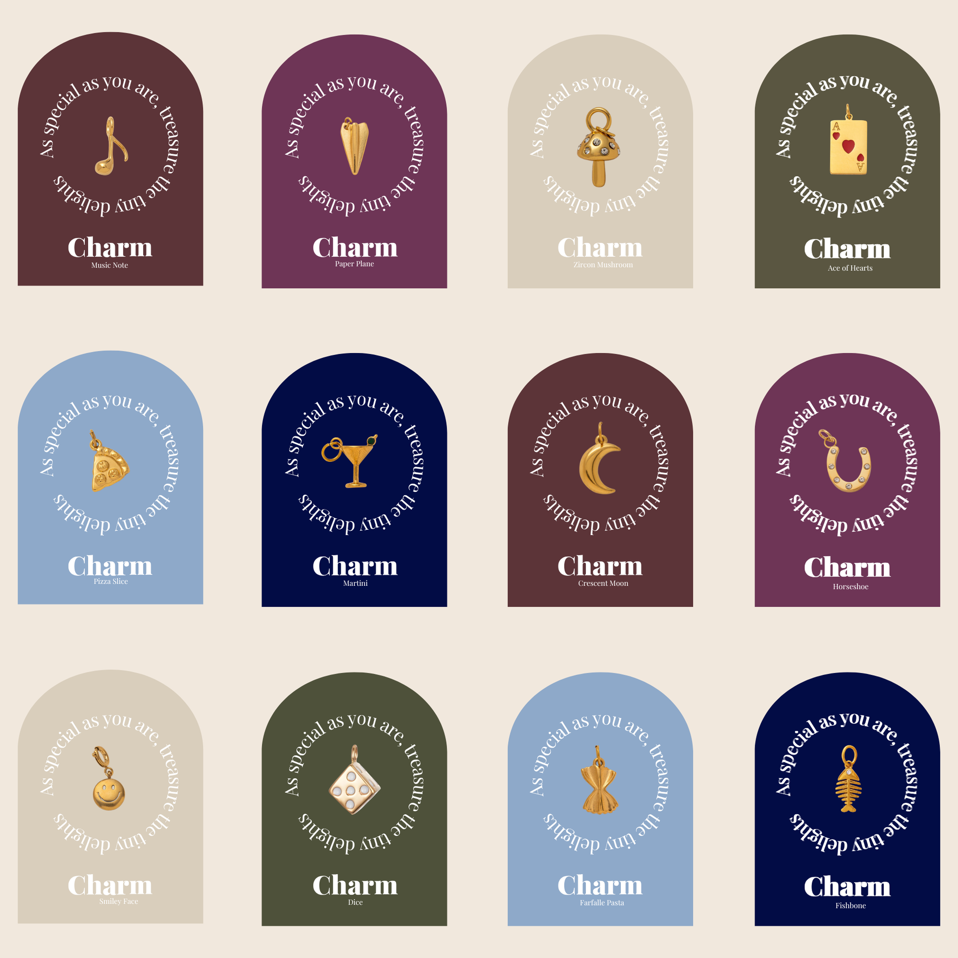 Flat lay of twelve gold Signature Charms BUNDLE cards, each showing a different miniature charm on a colorful arched backing card.