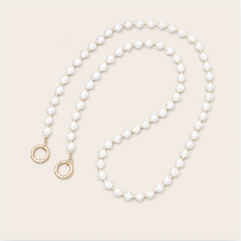 Thistle Pearl Phone Chain - round pearl bead chain, luxury packshot on beige background