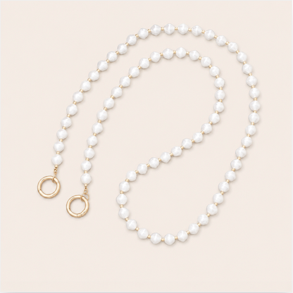 Thistle Pearl Phone Chain - round pearl bead chain, luxury packshot on beige background