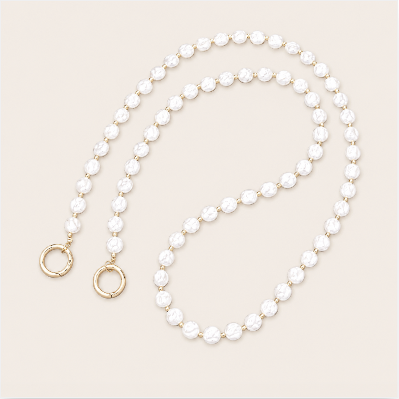 Thistle Pearl Phone Chain detail, luxury packshot on beige background