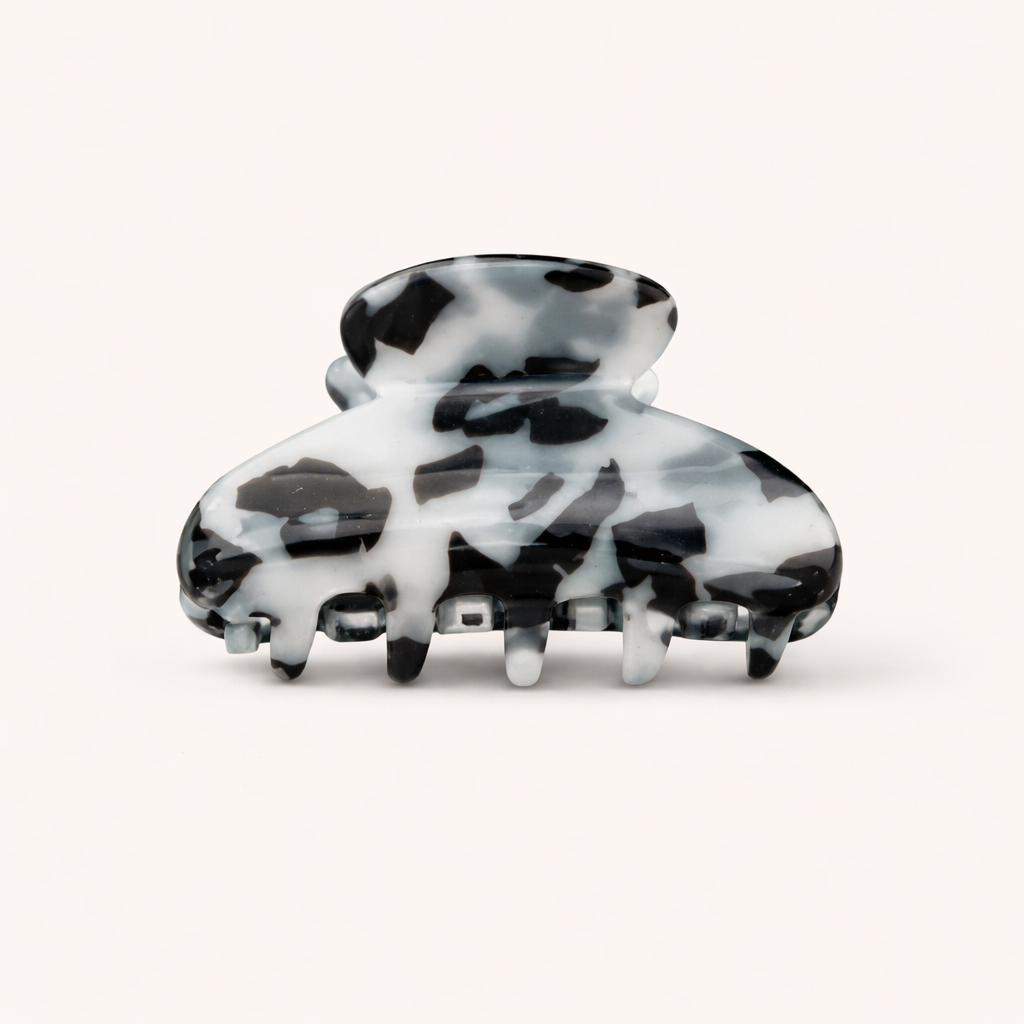 A black, white and grey mottled tortoiseshell Till Sun Up HAIR CLIP shown at an angle on a plain background.