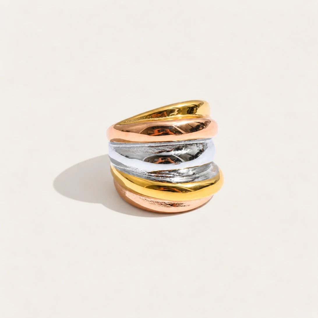 Two-tone Tressé RING: chunky gold-tone and silver-tone bands woven into one wide ring — Folie à Trois
