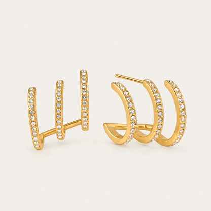 Gold Triad EARRINGS: three-band pavé ear climbers set with tiny white zirconia, shown front and side — Folie à Trois