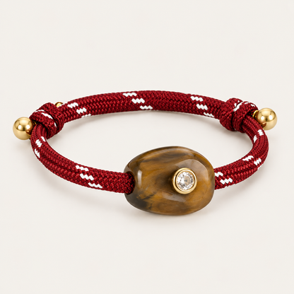 Truffle BRACELET in burgundy and amber: burgundy rope cord with a tiger's eye style stone and gold-set crystal, gold bead ends