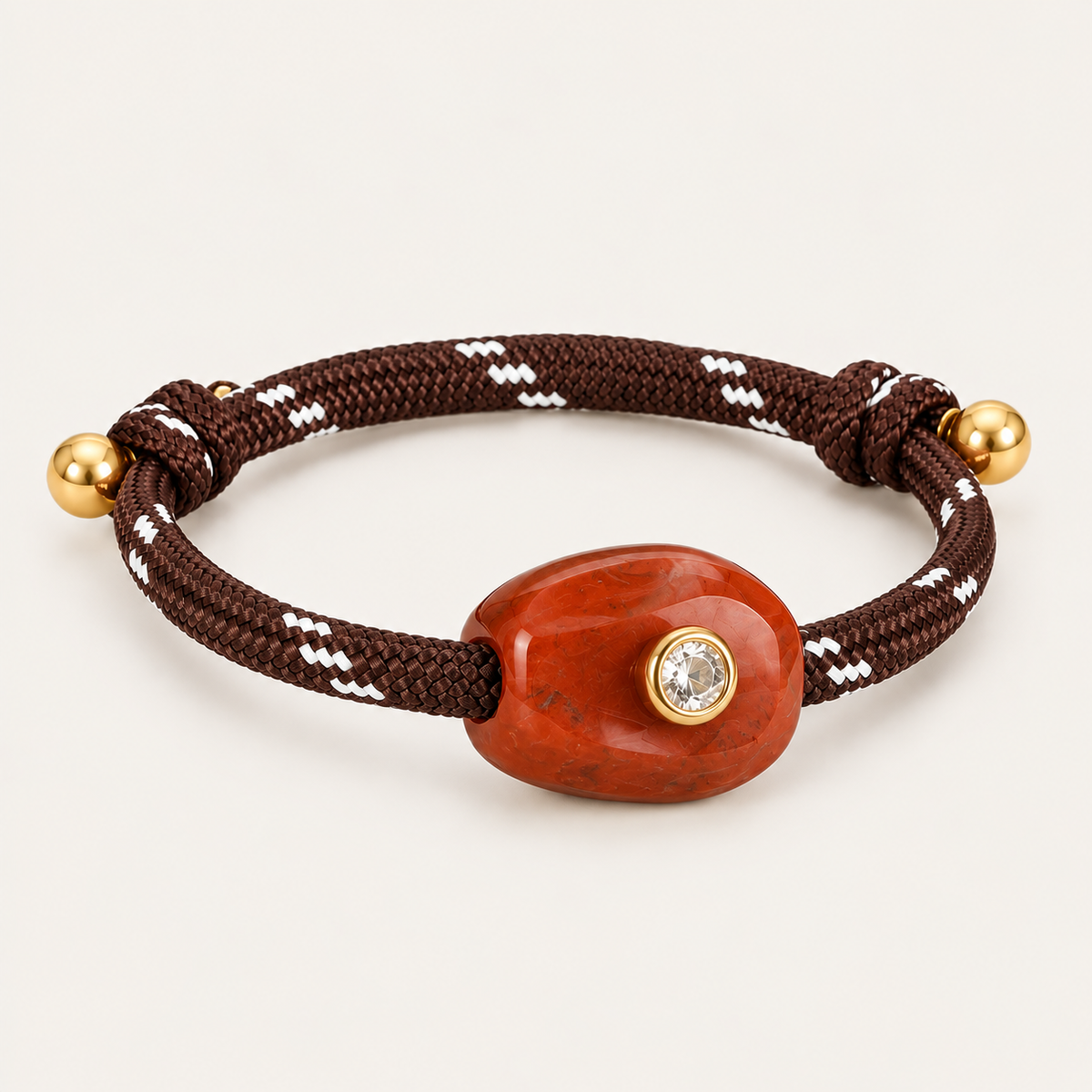 Truffle BRACELET in brown and red: dark brown rope cord with a red jasper style stone and gold-set crystal, adjustable bracelet