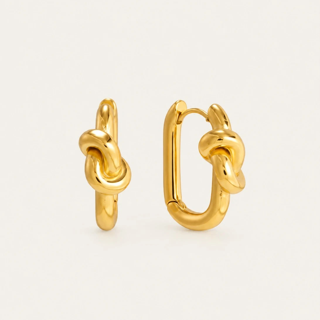 Gold Twine EARRINGS: rectangular huggie hoops with a sculpted knot detail, one shown open — Folie à Trois wholesale