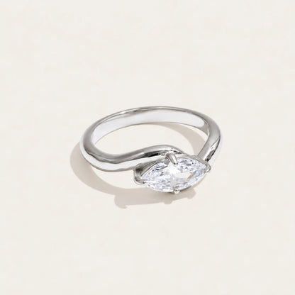 Silver-tone Vague RING: a broad, undulating wave band with a white zirconia set in the curve — Folie à Trois