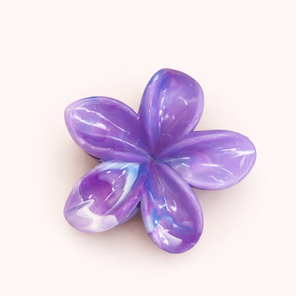 Virelle HAIR CLIP flower-shaped acetate claw clip in lilac purple with blue swirls, studio shot.