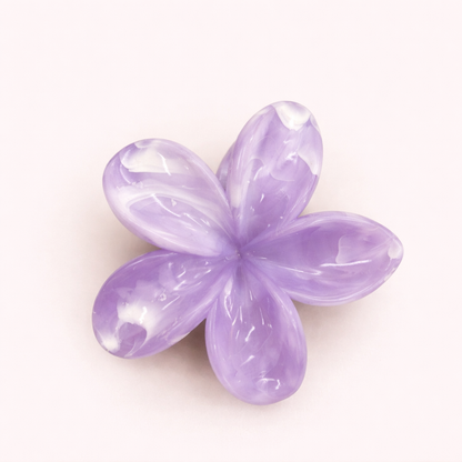 Virelle HAIR CLIP flower-shaped acetate claw clip in light lavender marbled with white, studio shot.