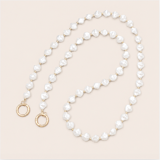 Winslow Pearl Phone Chain - irregular baroque pearl bead chain, luxury packshot on beige background