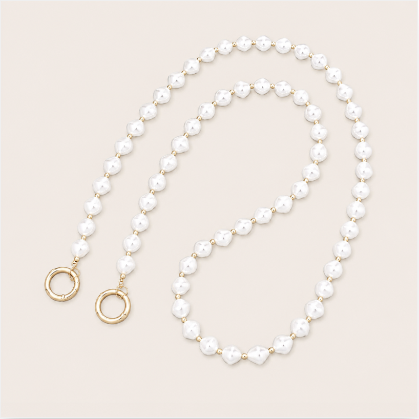 Winslow Pearl Phone Chain detail, luxury packshot on beige background