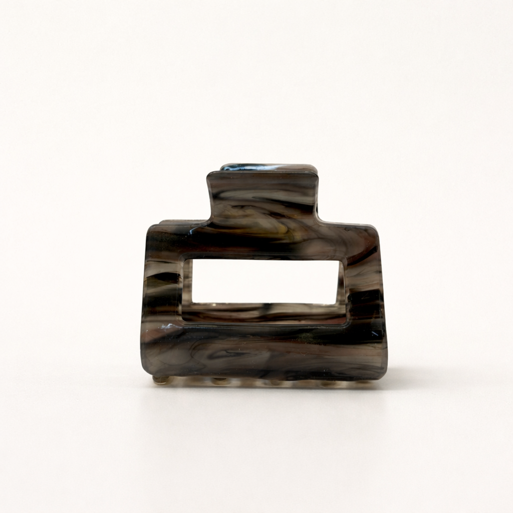 Wren HAIR CLIP rectangular acetate claw clip in a brown, black and grey marbled pattern, studio shot.