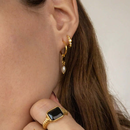 A model wears the You Ready SET in gold, layering the pavé climber hoop with the hexagon pearl dangle hoop along the ear.