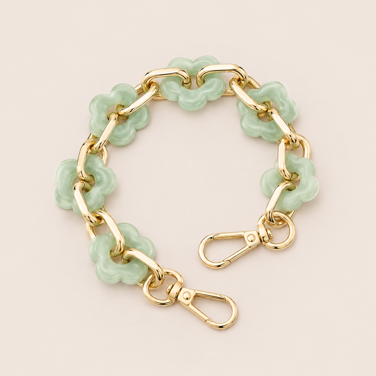 Round flower-link phone chain in sage green acrylic with gold chain links — Folie à Trois Zinnia wholesale phone chain