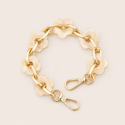 Round flower-link phone chain in ivory acrylic with gold chain links — Folie à Trois Zinnia wholesale phone chain