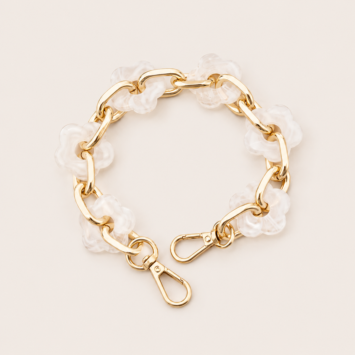 Round flower-link phone chain in frosted white acrylic with gold chain links — Folie à Trois Zinnia wholesale phone chain