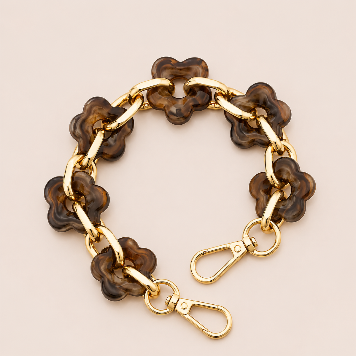 Round flower-link phone chain in deep brown tortoiseshell acrylic with gold chain links — Folie à Trois Zinnia wholesale phone chain
