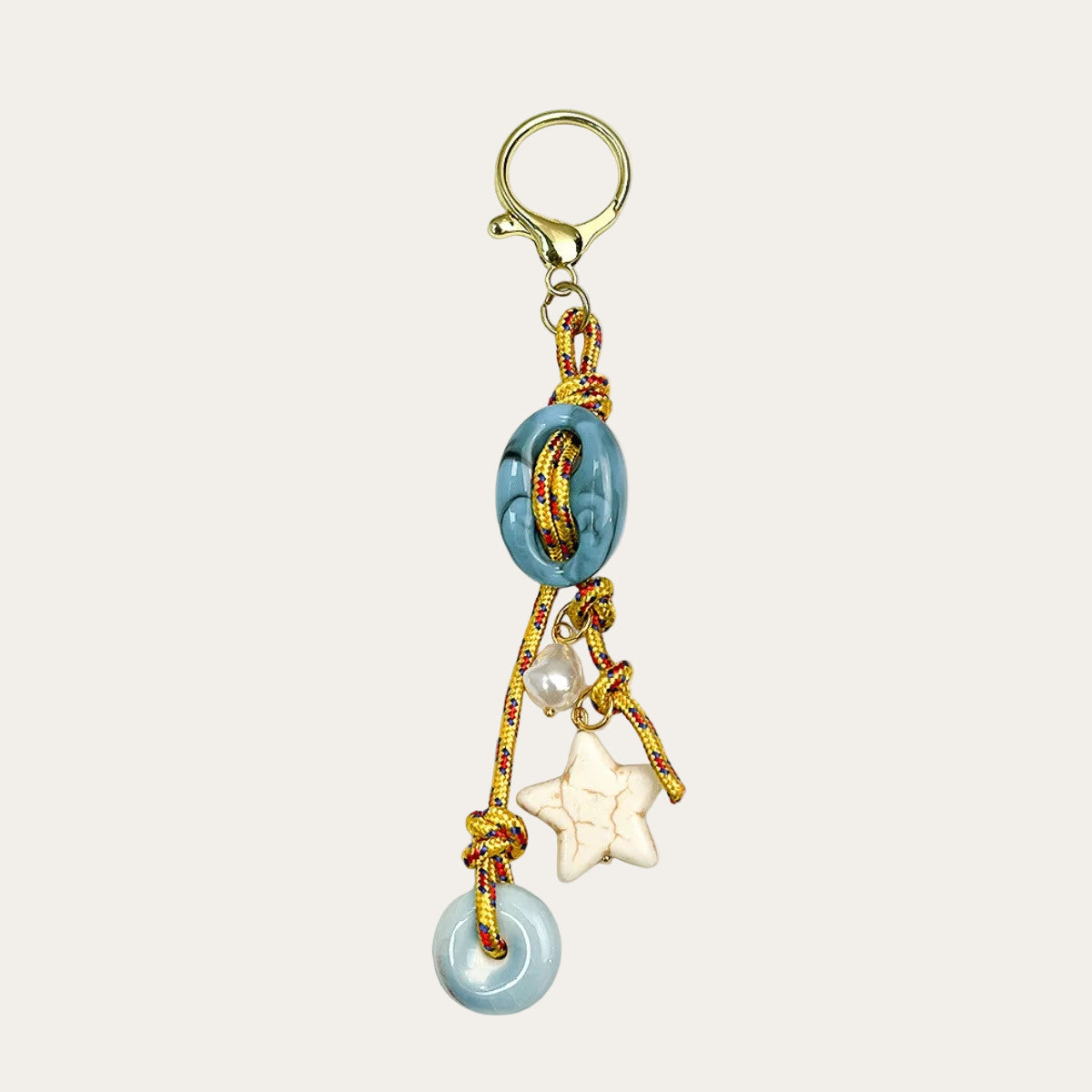 Celeste BAG CHARM - blue and cream beaded tassel with star and pearl charms