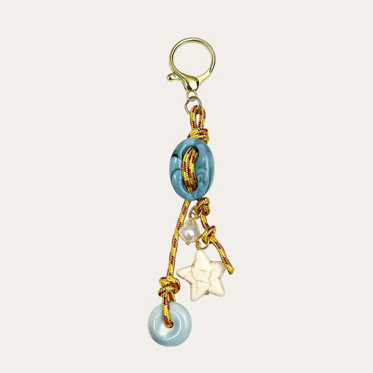 Celeste BAG CHARM - blue and cream beaded tassel with star and pearl charms
