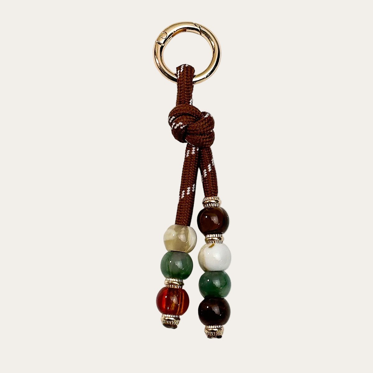 Nodo BAG CHARM Cognac - brown paracord with cognac tone beads