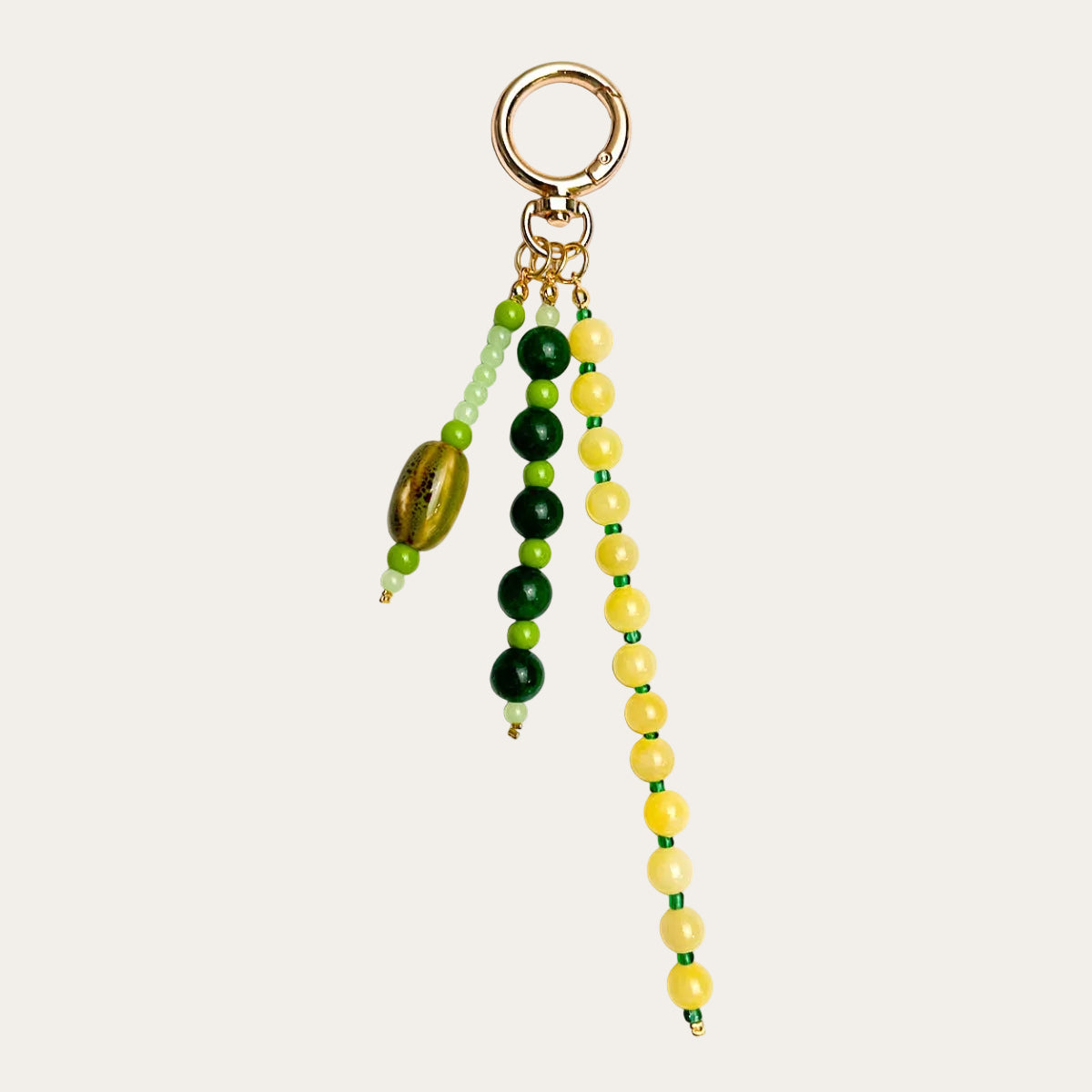 Isadora BAG CHARM Citrus - green and yellow beaded strands with tiger eye stone