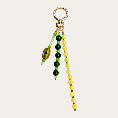 Isadora BAG CHARM Citrus - green and yellow beaded strands with tiger eye stone