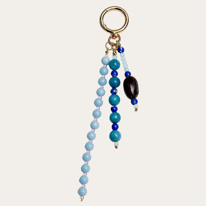 Isadora BAG CHARM Denim - blue beaded strands with tiger eye stone