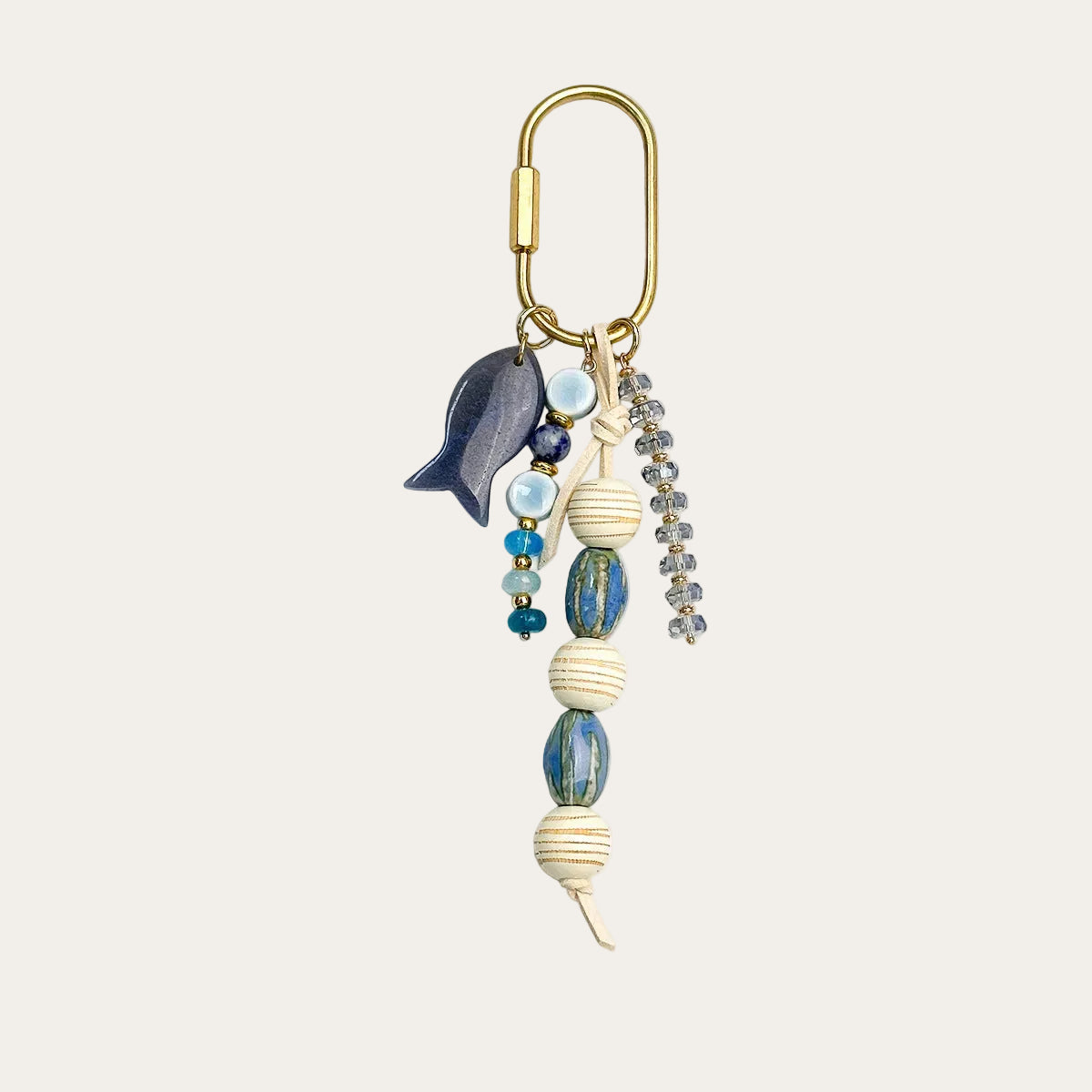 Pescado BAG CHARM Sandstone Fish - navy enamel fish charm with cream striped beads