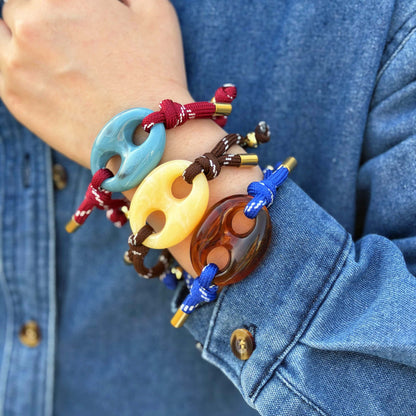 Pecan Pig Nose BRACELET - tortoise brown, butter yellow and turquoise blue pig nose charms on colorful rope cords, stacked on the wrist