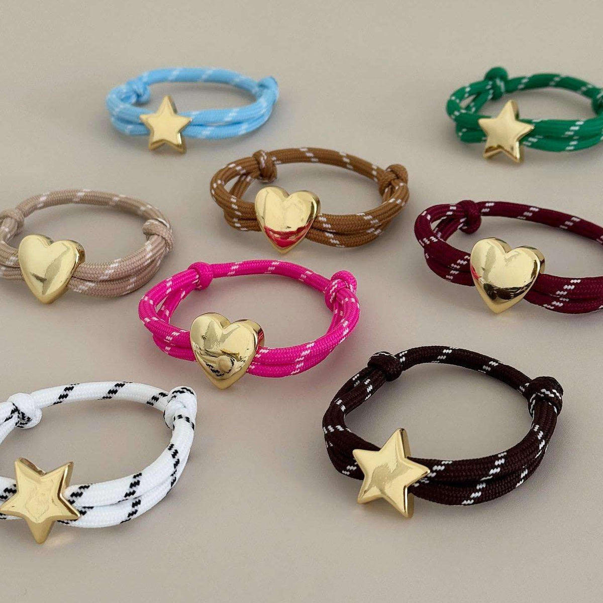 Acorn BRACELET - puffy gold heart and star charms on colorful rope cords