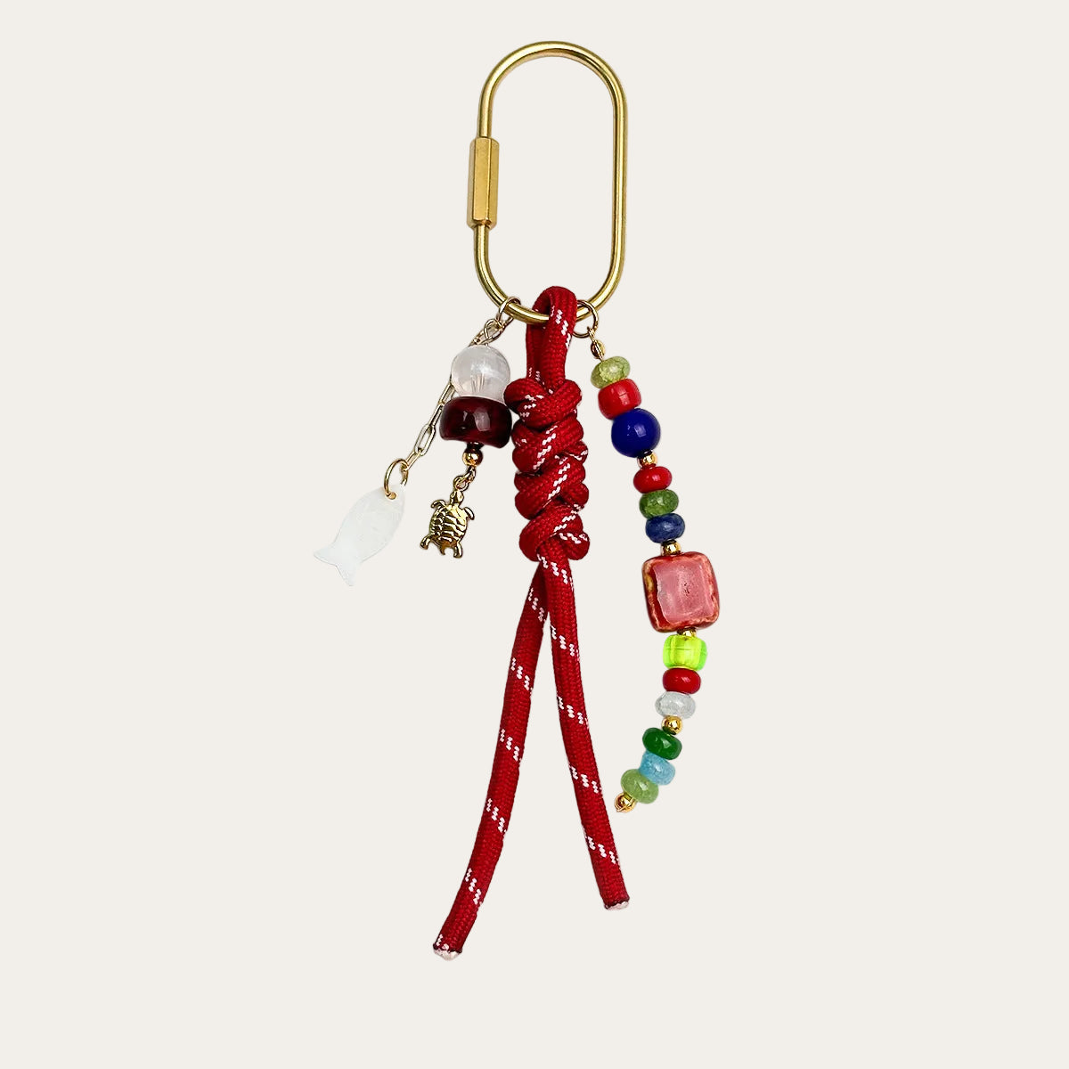 Marisol BAG CHARM Scarlet Turtle - red woven cord with colorful beads and gold turtle charm